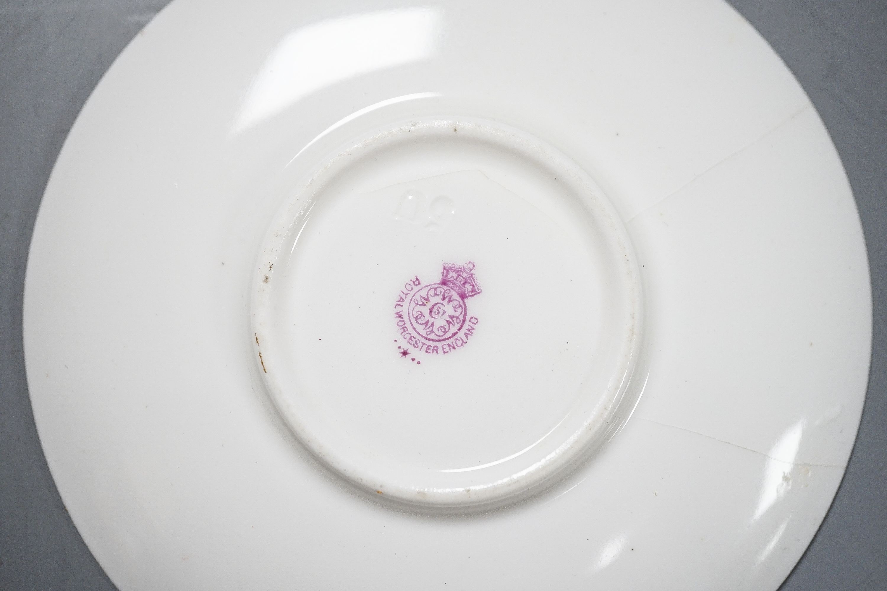 A Royal Worcester fruit painted small pot pourri and cover, 10.9cm high and a similar vase, 15cm, a Royal Worcester miniature cup and saucer, painted with pheasants, signed James Stinton and Grainger & Co pheasant vase